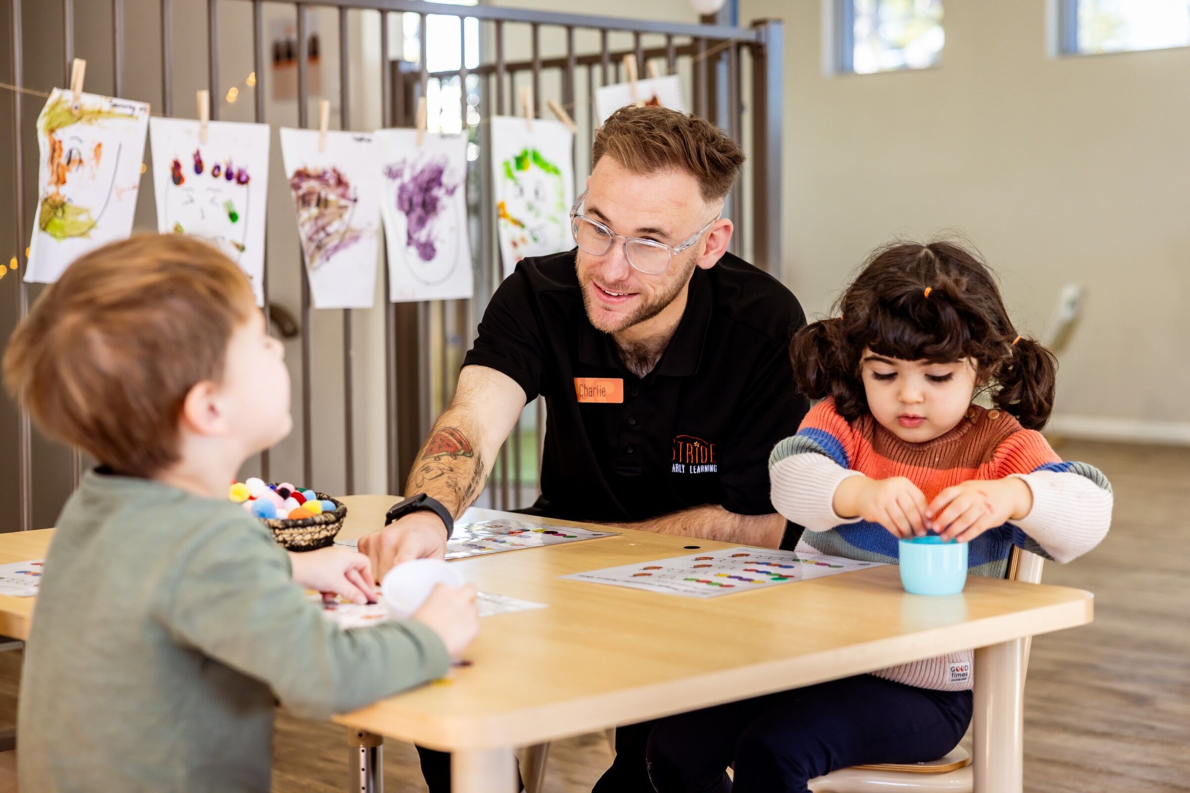 Child Care Subsidy Changes in 2026: What It Means for Your Family Early learning educator engaging toddlers in a hands-on classroom activity.
