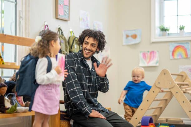 About Us Father dropping off child at an early learning centre in Perth, highlighting the best childcare Perth